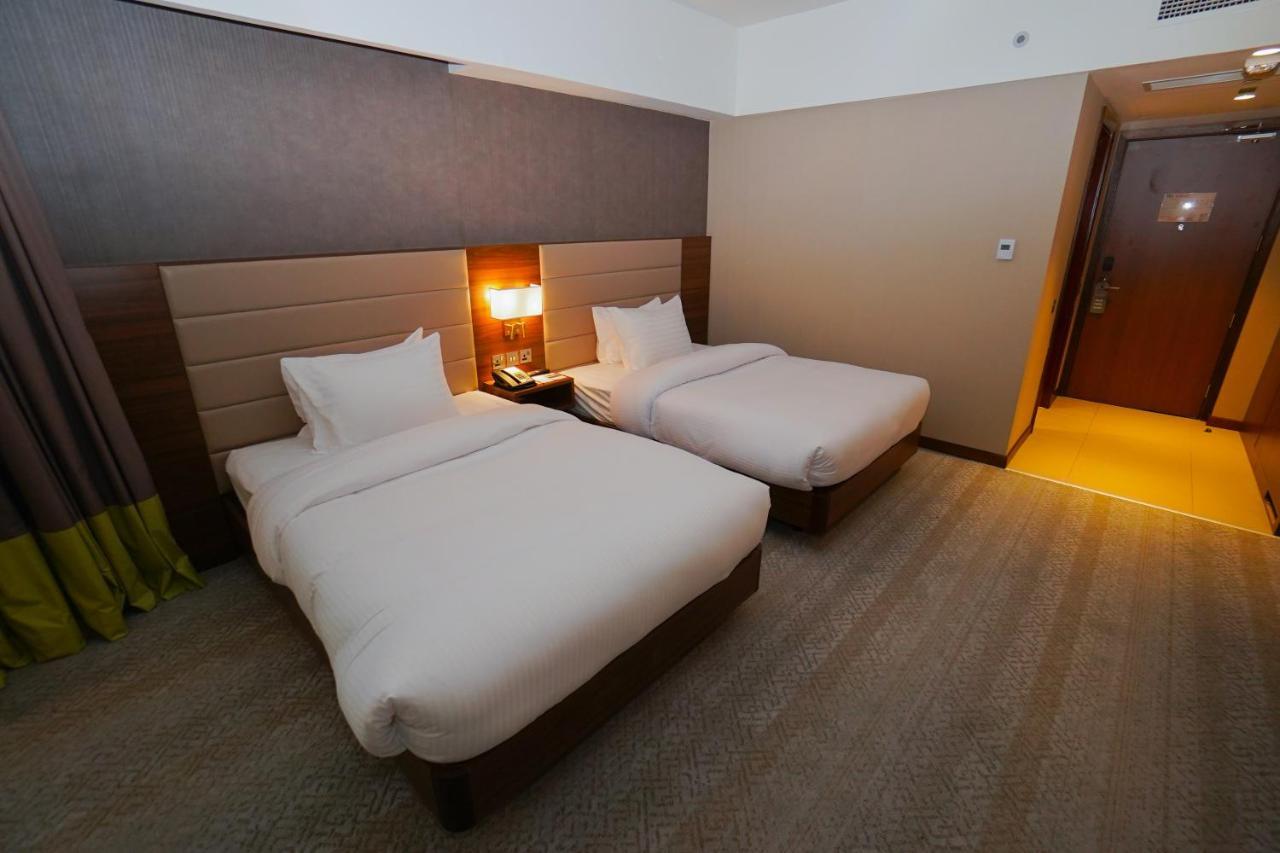 The Grand Lux Hotel Doha Buitenkant foto Deluxe room