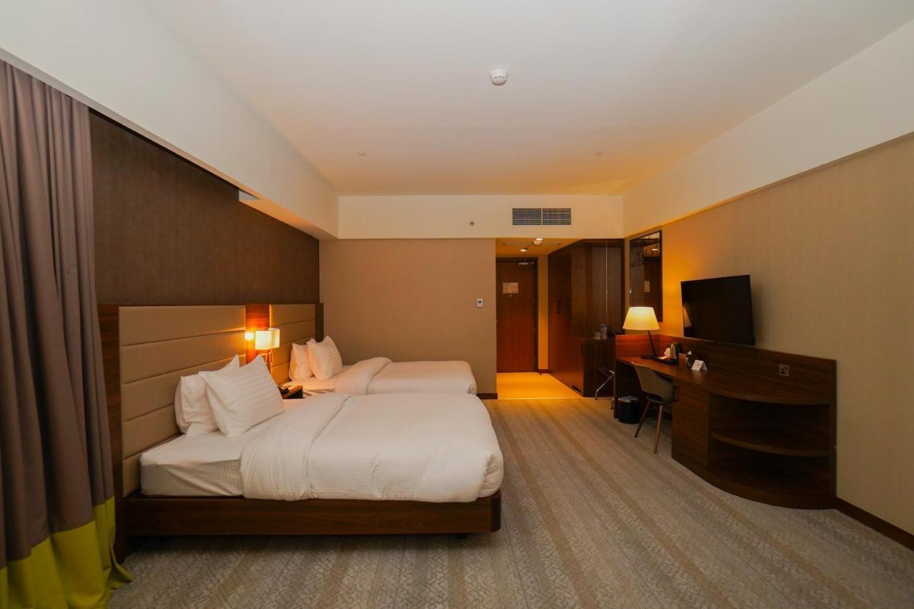 The Grand Lux Hotel Doha Buitenkant foto Deluxe room